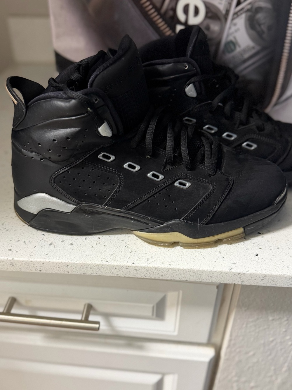 Jordan Black High-Top Basketball Sneakers with Silver Accents